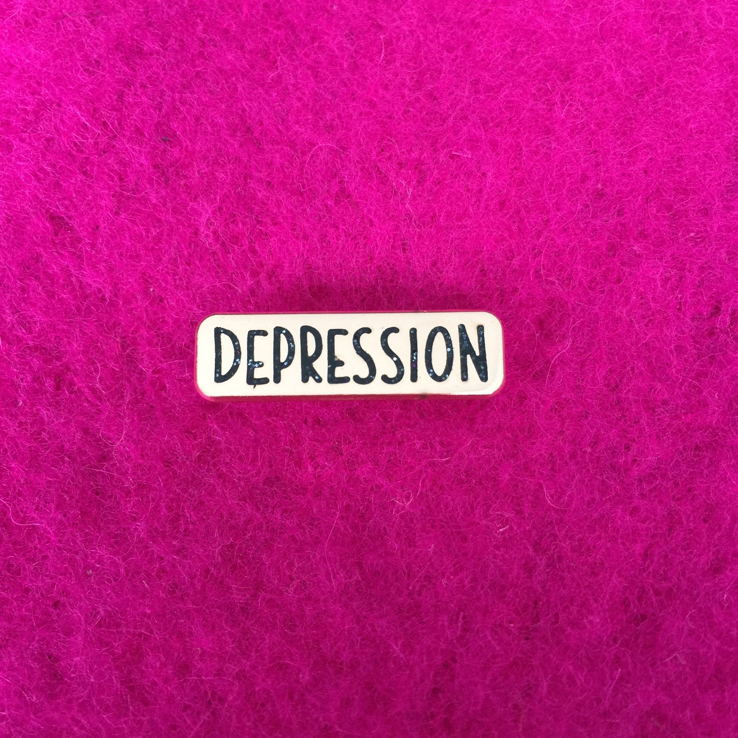 Depression Pin